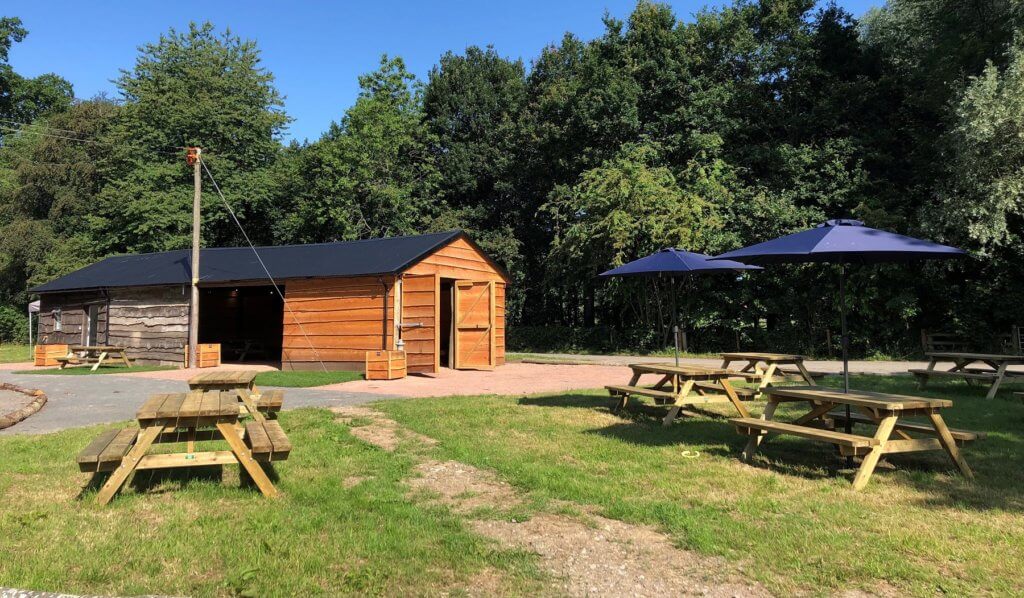 The Woodshed with a blue sky