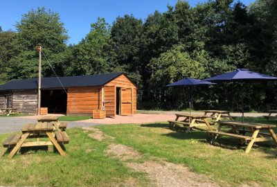 The Woodshed with a blue sky