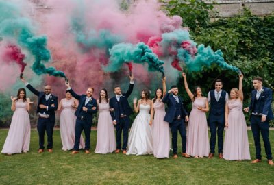 Couple and their party letting off smoke bombs on the lower terrace